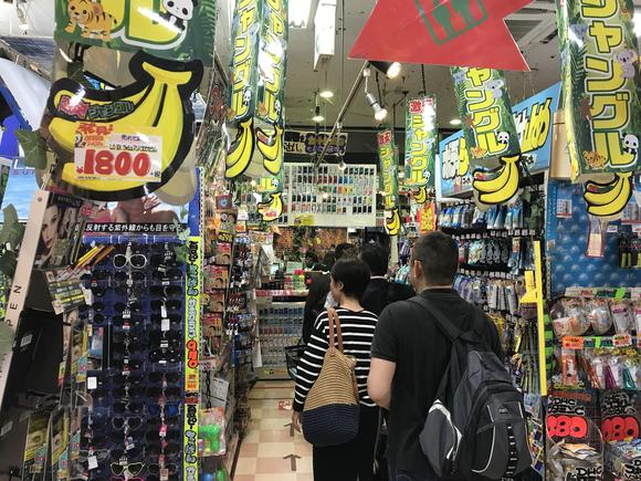 Shoppers wander through a Don Quijote store in Tokyo on June 6.