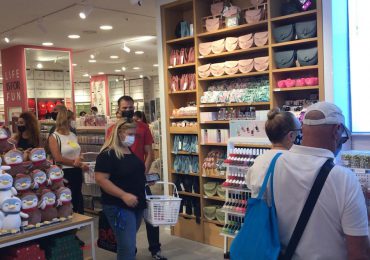 Customers shopping with masks at the inaugural MINISO store in the Canary Islands, Spain